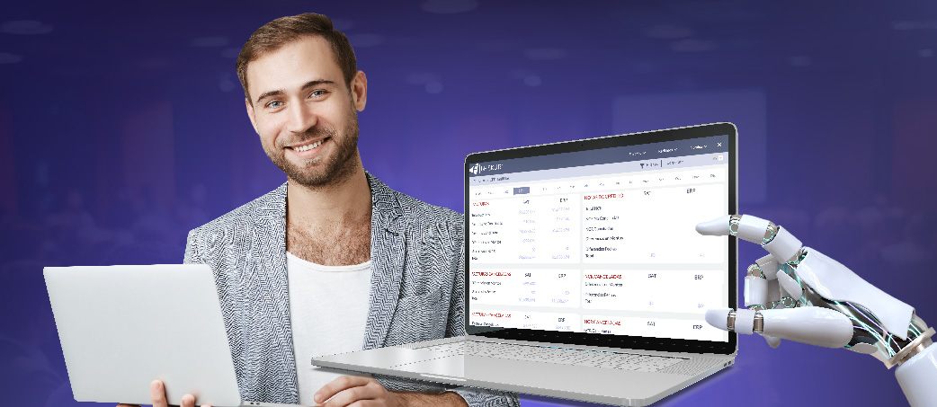 Una persona y una mano robot junto con una laptop